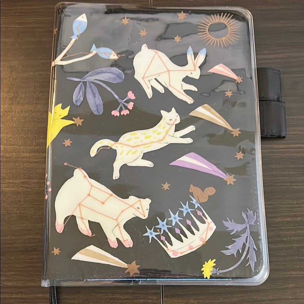 Black A5 cover with cover on cover (Light in the Distance by Yuka Hiiragi)